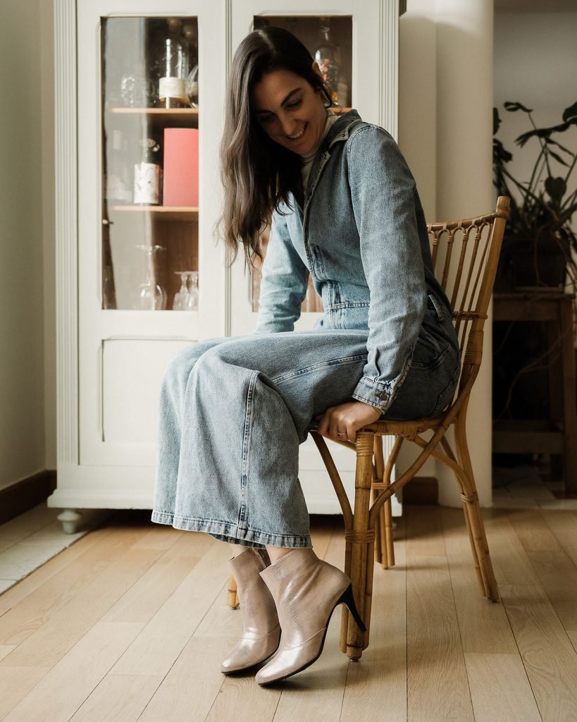 Heeled boot in bronze viperine and smooth black leather-1