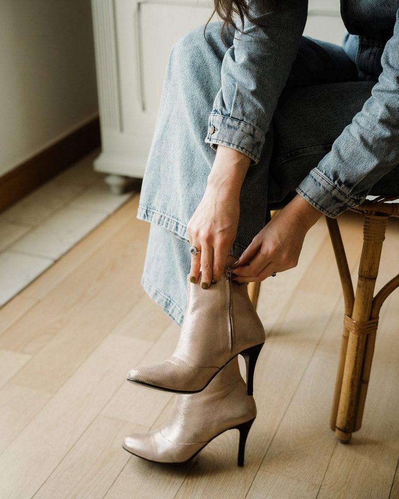 Heeled boot in bronze viperine and smooth black leather-3