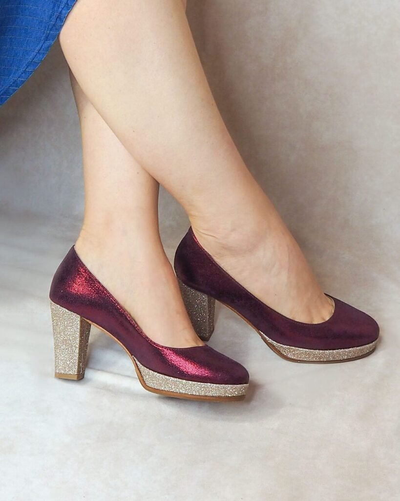 Platform pumps in iridescent garnet and fine blond gold sequins