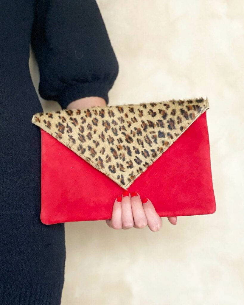 Red velvet and leopard clutch bag