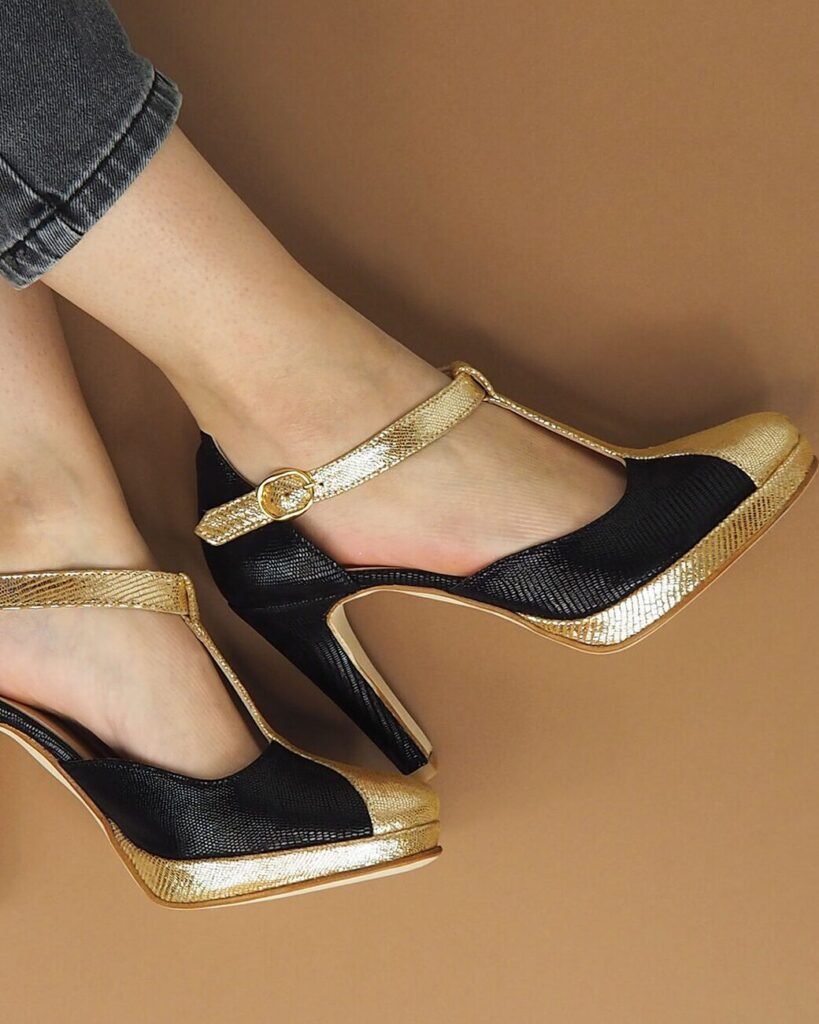 Platform Salomé in black viperine with bronze viperine straps