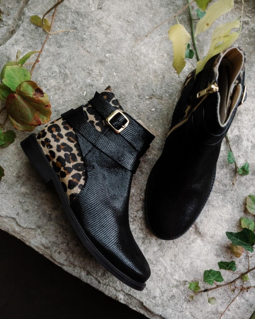 Carla boots in black viperine and leopard fur